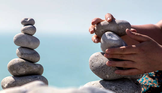 meditation stone towers in the process of being created