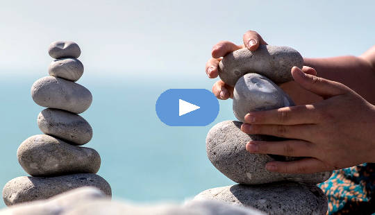 meditation stone towers in the process of being created