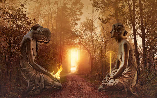 two figures facing each other in a forested area in front of a portal of light