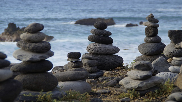 numerous stone towers facing the ocean