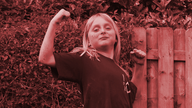 young girl in a pose of successful achievement