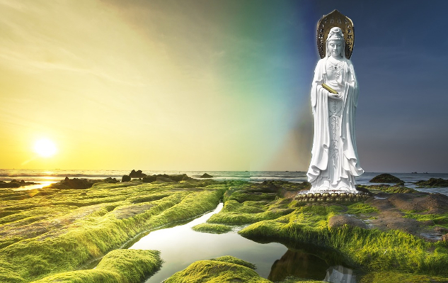 a statue of Guanyin, the goddes of compassion, outside in the marshes