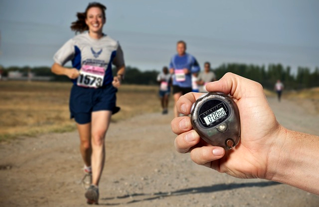 smiling woman running a race