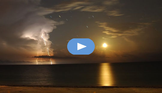 Lightning and the Moon. Photo by Marc-André Besel. 