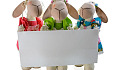 soft toys holding up a blank label